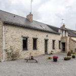 façade en pierre vue et ardoise