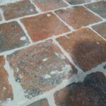 Dépose et repose de tommettes dans un château